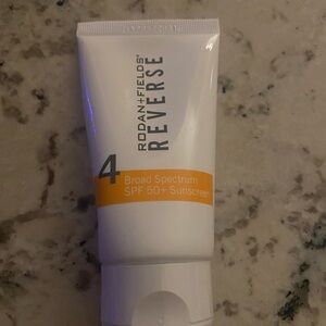 Rodan + Fields Reverse SPF 50+ Sunscreen - White and Orange